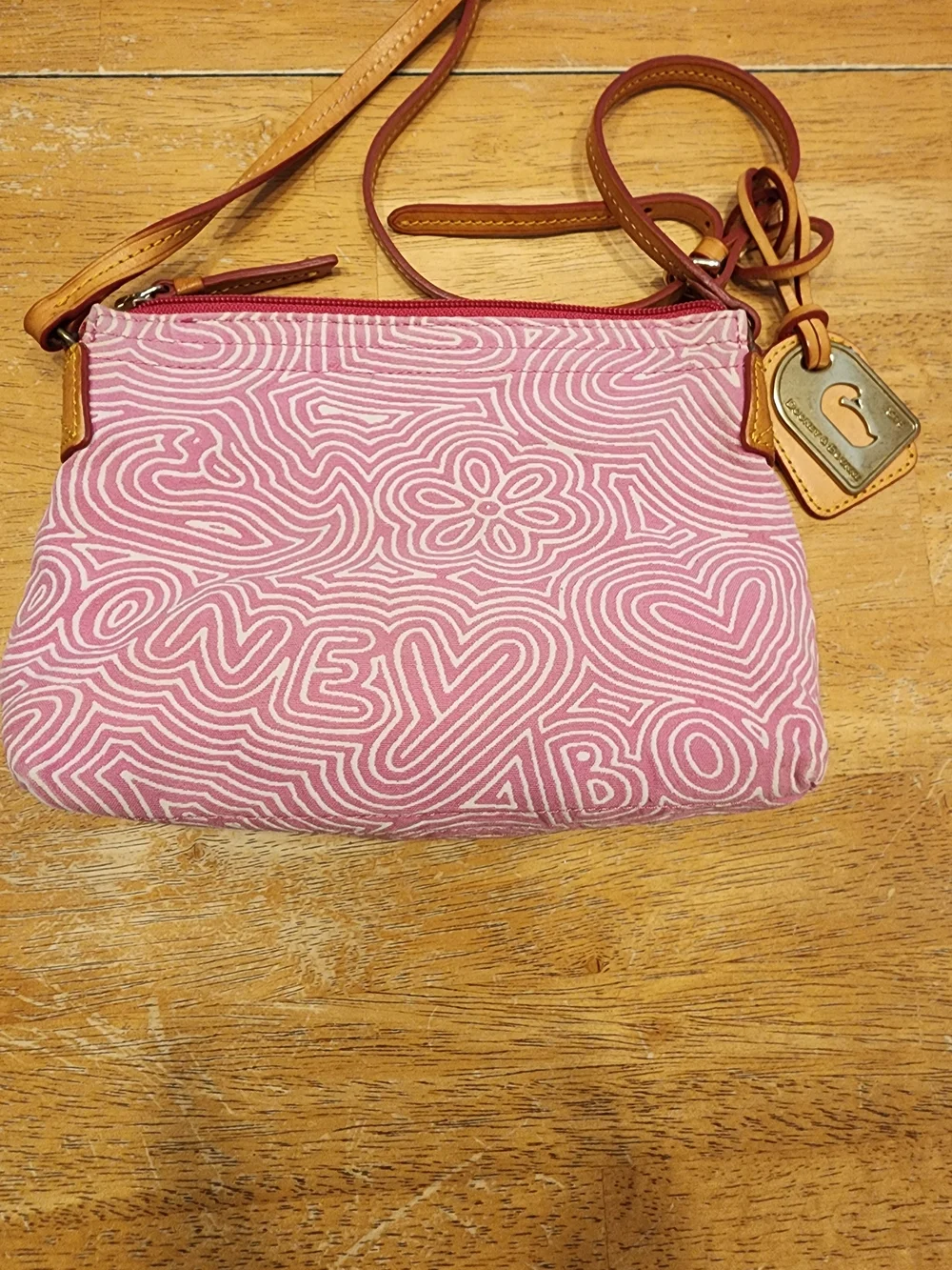Dooney & Bourke pink doodle swirl canvas mini shoulder bag featuring tan leather